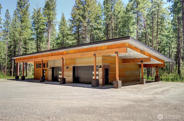 19 Davelaar Dr, Mazama, WA 98833 - garage with gravel driveway