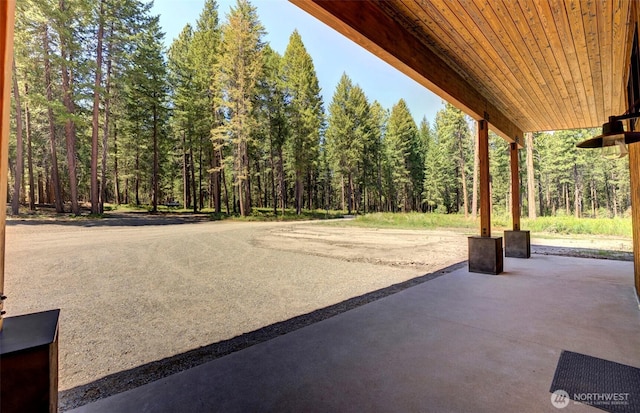 19 Davelaar Dr, Mazama, WA 98833 - view of patio / terrace with a wooded view