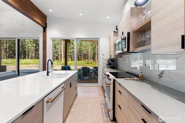 19 Davelaar Dr, Mazama, WA 98833 - kitchen with white appliances, a sink, light countertops, healthy amount of natural light, and recessed lighting