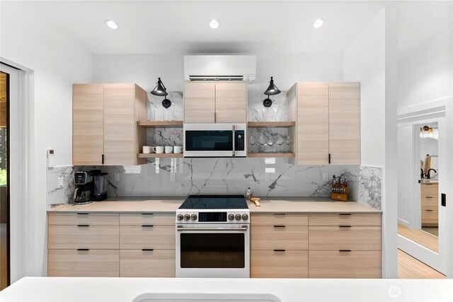 19 Davelaar Dr, Mazama, WA 98833 - kitchen with open shelves, light brown cabinets, electric stove, white microwave, and recessed lighting