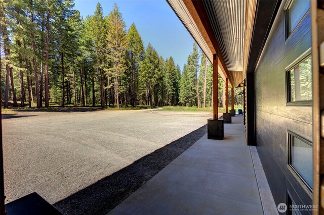 19 Davelaar Dr, Mazama, WA 98833 - view of patio / terrace featuring a forest view