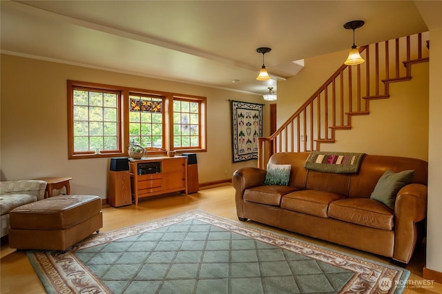 472 Redtail Ln, Lopez Island, WA 98261 - living room featuring light wood-style flooring, stairway, ornamental molding, and baseboards