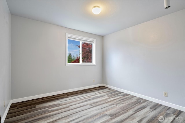 2 199th Pl SE, Bothell, WA 98012 - unfurnished room with wood finished floors and baseboards