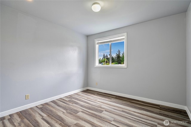 2 199th Pl SE, Bothell, WA 98012 - unfurnished room with wood finished floors and baseboards