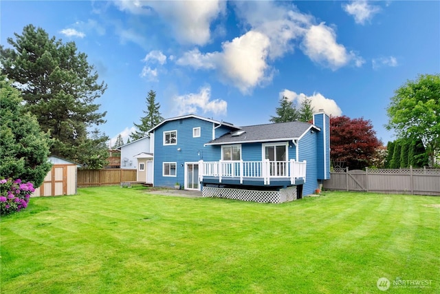 2 199th Pl SE, Bothell, WA 98012 - rear view of property with a wooden deck, a chimney, and roof with shingles