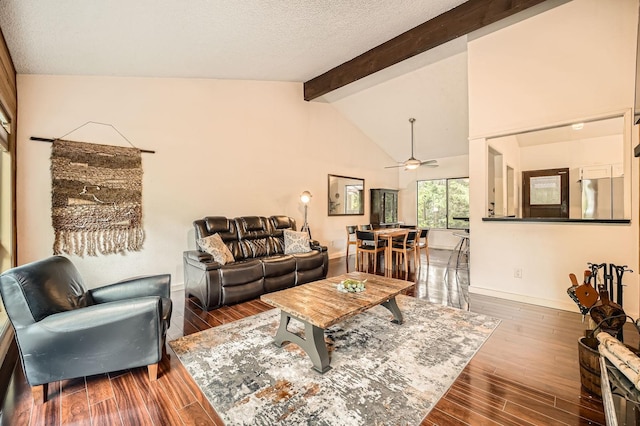 2617 35th Ave SE, Puyallup, WA 98374 - living room featuring a ceiling fan, wood finished floors, a textured ceiling, and baseboards