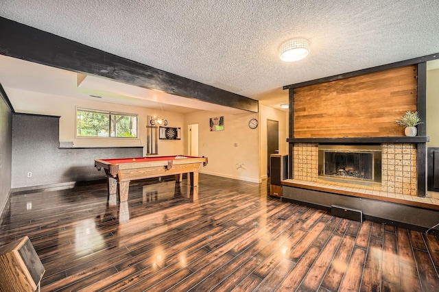 2617 35th Ave SE, Puyallup, WA 98374 - rec room with a textured ceiling, billiards, wood finished floors, baseboards, and a tile fireplace