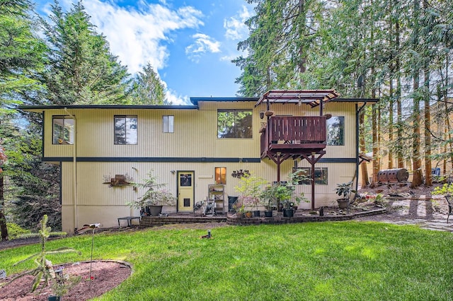 2617 35th Ave SE, Puyallup, WA 98374 - rear view of house featuring a lawn