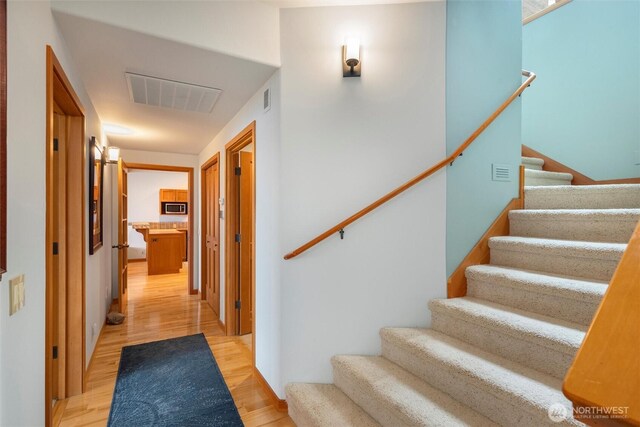 2778 N Nugent Rd N, Lummi Island, WA 98262 - stairway featuring wood finished floors