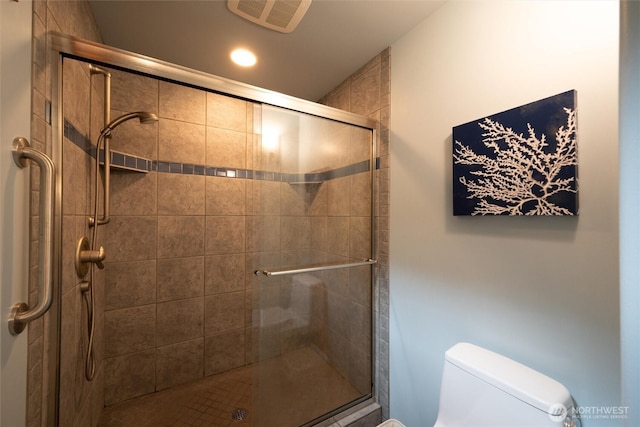 2778 N Nugent Rd N, Lummi Island, WA 98262 - full bathroom featuring toilet, a stall shower, and recessed lighting