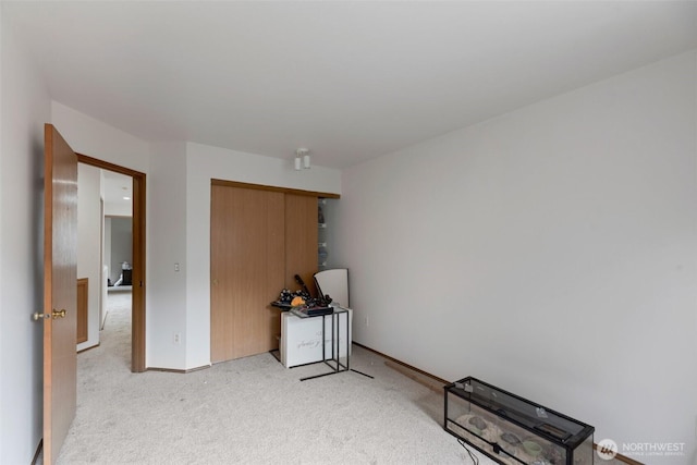 707 S 32nd, Renton, WA 98055 - unfurnished bedroom featuring light colored carpet, a closet, and baseboards