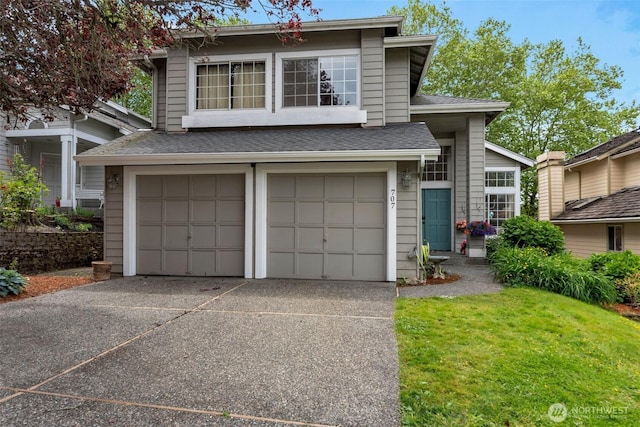707 S 32nd, Renton, WA 98055 - view of front of property with an attached garage, concrete driveway, roof with shingles, and a front lawn
