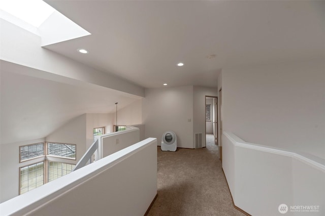 707 S 32nd, Renton, WA 98055 - corridor with an upstairs landing, carpet, a skylight, and recessed lighting