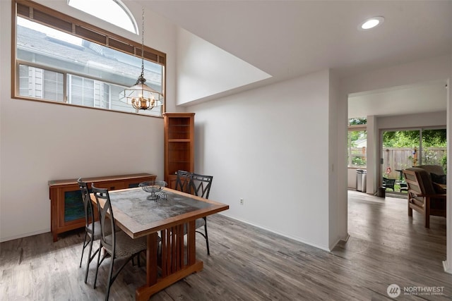 707 S 32nd, Renton, WA 98055 - dining area with wood finished floors, a chandelier, recessed lighting, and baseboards
