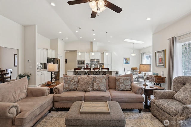 1172 Matterhorn Loop, Camano Island, WA 98282 - living room featuring vaulted ceiling, ceiling fan, and recessed lighting