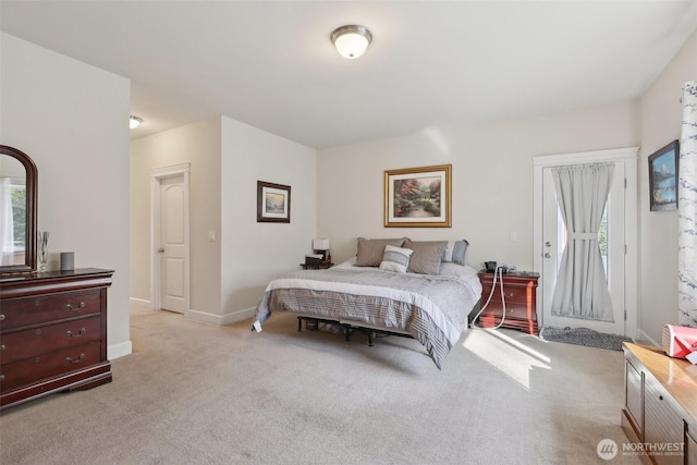 1172 Matterhorn Loop, Camano Island, WA 98282 - carpeted bedroom featuring access to outside and baseboards