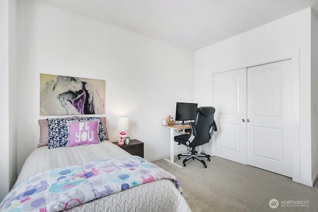 14144 270th Ln NE, Duvall, WA 98019 - bedroom featuring carpet floors, a closet, an office area, and baseboards