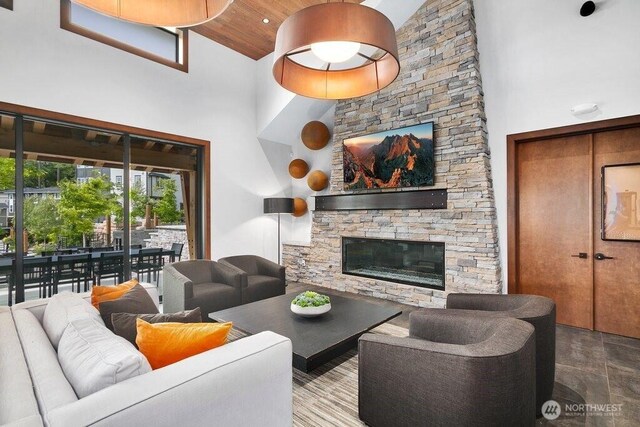 14144 270th Ln NE, Duvall, WA 98019 - living room featuring high vaulted ceiling and a fireplace