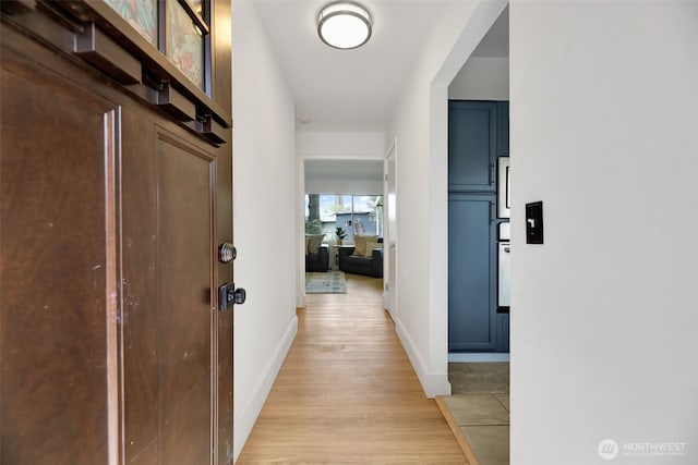 1302 Park Ave, Snohomish, WA 98290 - corridor featuring light wood-type flooring and baseboards