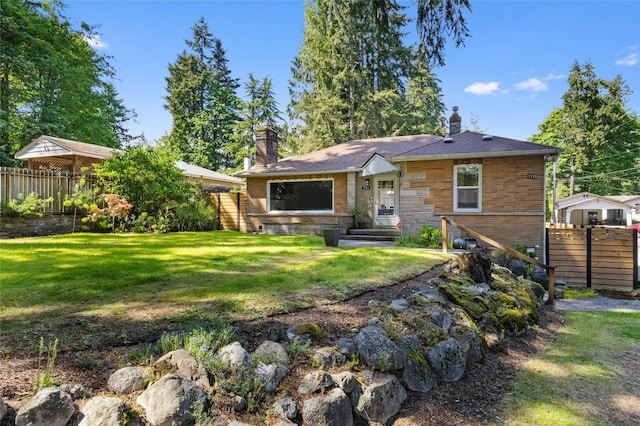 7715 236th St SW, Edmonds, WA 98026 - view of front of house featuring a chimney and brick siding