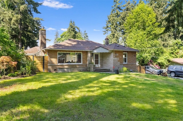 7715 236th St SW, Edmonds, WA 98026 - view of front of home with a chimney and brick siding
