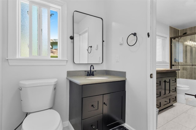 7715 236th St SW, Edmonds, WA 98026 - bathroom featuring toilet, vanity, and a shower with shower door