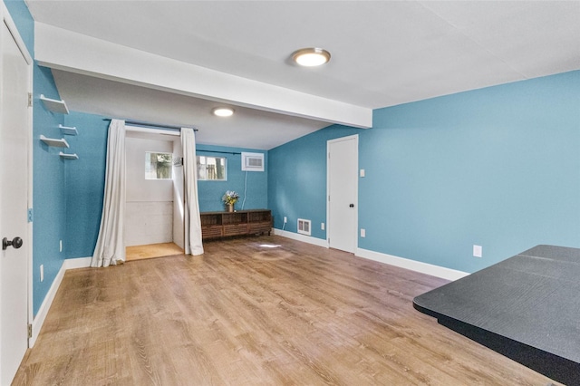 7715 236th St SW, Edmonds, WA 98026 - unfurnished living room featuring wood finished floors and baseboards