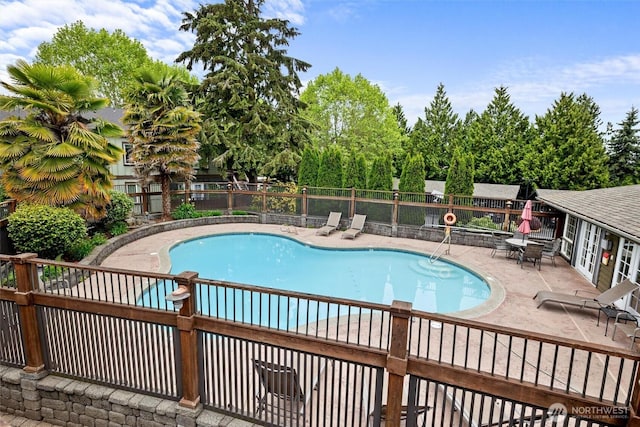 21301 48th Ave W Unit A104, Mountlake Terrace, WA 98043 - community pool featuring a patio and view of scattered trees