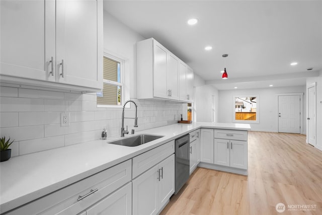 3514 S Tyler St, Tacoma, WA 98409 - kitchen with dishwasher, a sink, light countertops, recessed lighting, and plenty of natural light