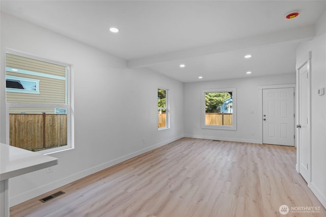 3514 S Tyler St, Tacoma, WA 98409 - unfurnished room with light wood finished floors, recessed lighting, baseboards, and beamed ceiling