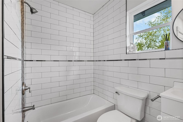 3514 S Tyler St, Tacoma, WA 98409 - full bathroom featuring toilet, vanity, tub / shower combination, and tile walls