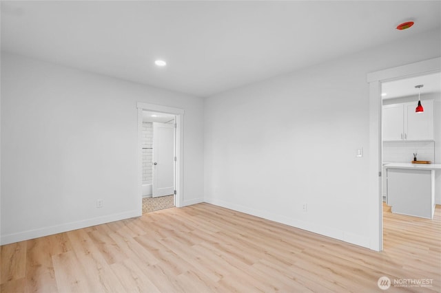 3514 S Tyler St, Tacoma, WA 98409 - unfurnished room featuring light wood-style flooring, recessed lighting, and baseboards