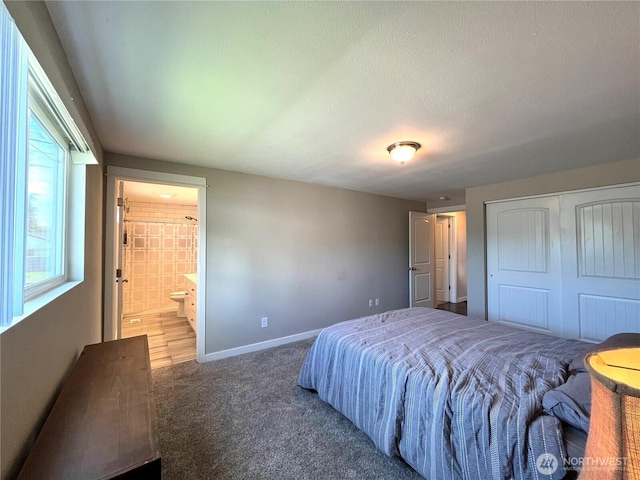 6612 E B St, Tacoma, WA 98404 - bedroom featuring carpet flooring, a closet, baseboards, and ensuite bath