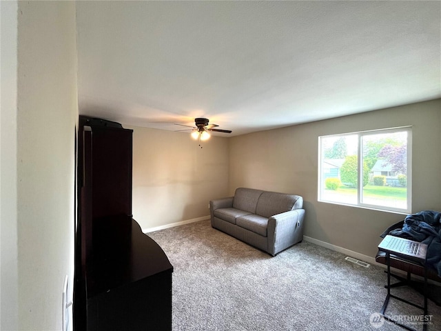 6612 E B St, Tacoma, WA 98404 - carpeted living area featuring a ceiling fan and baseboards