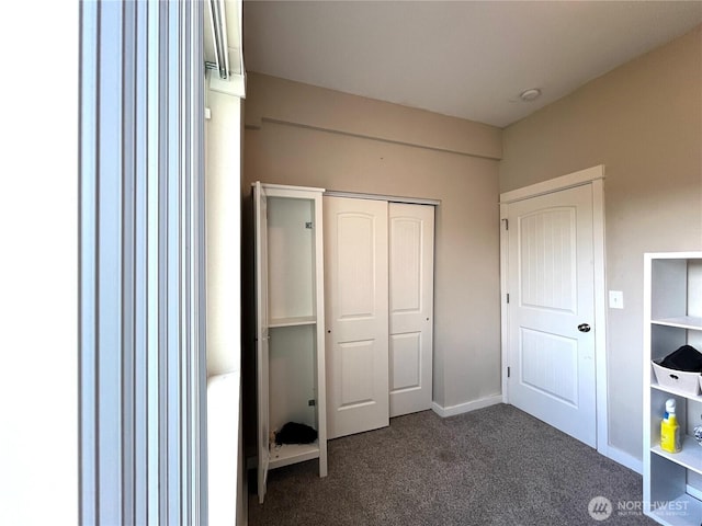 6612 E B St, Tacoma, WA 98404 - unfurnished bedroom featuring dark colored carpet and a closet