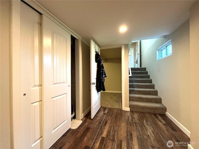 6612 E B St, Tacoma, WA 98404 - below grade area featuring dark wood-type flooring, stairway, and baseboards
