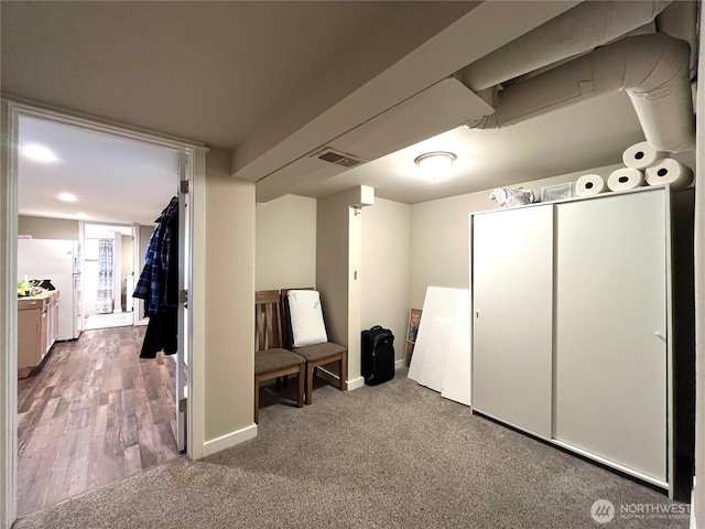 6612 E B St, Tacoma, WA 98404 - finished basement featuring freestanding refrigerator, baseboards, and carpet