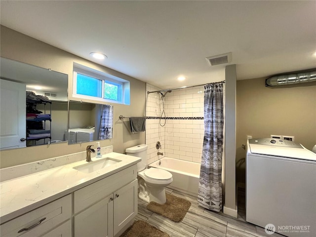 6612 E B St, Tacoma, WA 98404 - bathroom with washer / clothes dryer, toilet, vanity, shower / bath combo, and recessed lighting