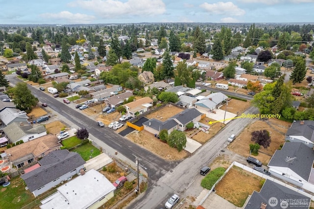 6612 E B St, Tacoma, WA 98404 - aerial view of property and surrounding area with nearby suburban area