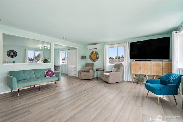 177 N Razor Clam Dr SW, Ocean Shores, WA 98569 - living area featuring an AC wall unit, plenty of natural light, wood finished floors, and recessed lighting