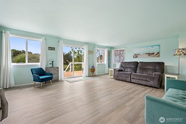 177 N Razor Clam Dr SW, Ocean Shores, WA 98569 - living area with light wood-style floors and baseboards