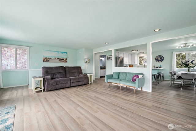 177 N Razor Clam Dr SW, Ocean Shores, WA 98569 - living area featuring light wood finished floors, baseboards, and recessed lighting