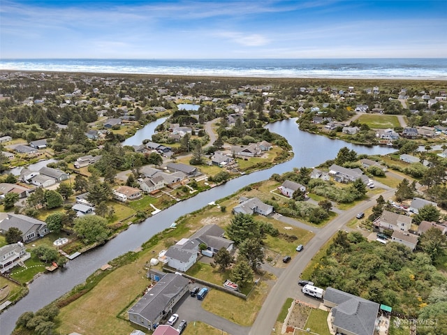 177 N Razor Clam Dr SW, Ocean Shores, WA 98569 - aerial view of property and surrounding area with a large body of water and nearby suburban area