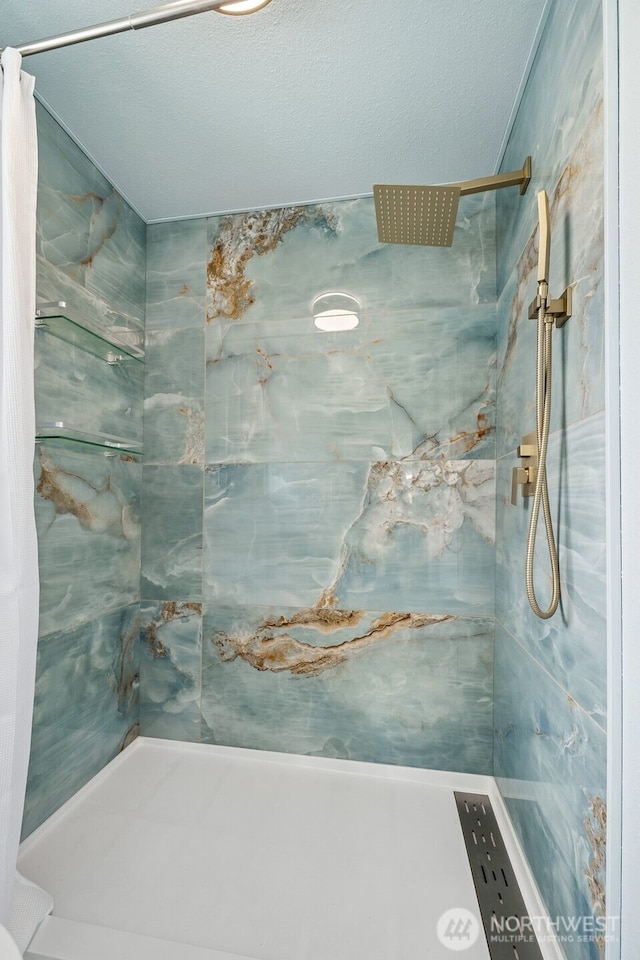 177 N Razor Clam Dr SW, Ocean Shores, WA 98569 - full bathroom with a marble finish shower