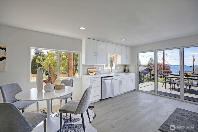 275 Maple St, Camano Island, WA 98282 - dining space featuring light wood-type flooring and recessed lighting
