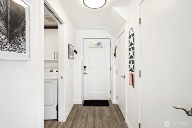 817 Kitsap St, Port Orchard, WA 98366 - doorway with washer / dryer, wood finished floors, baseboards, and vaulted ceiling