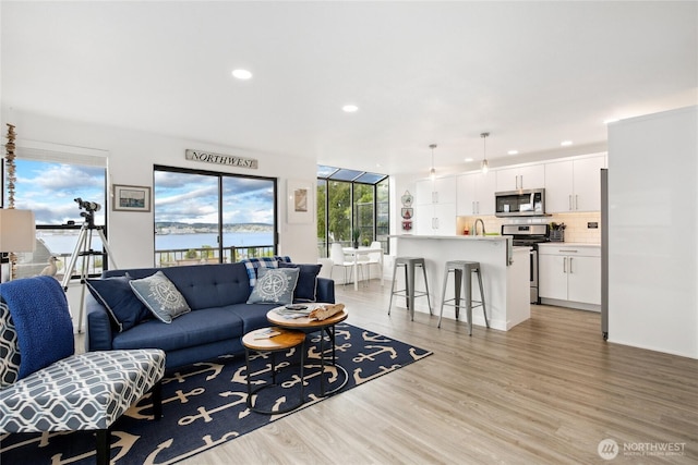 817 Kitsap St, Port Orchard, WA 98366 - living area with recessed lighting and light wood-style flooring