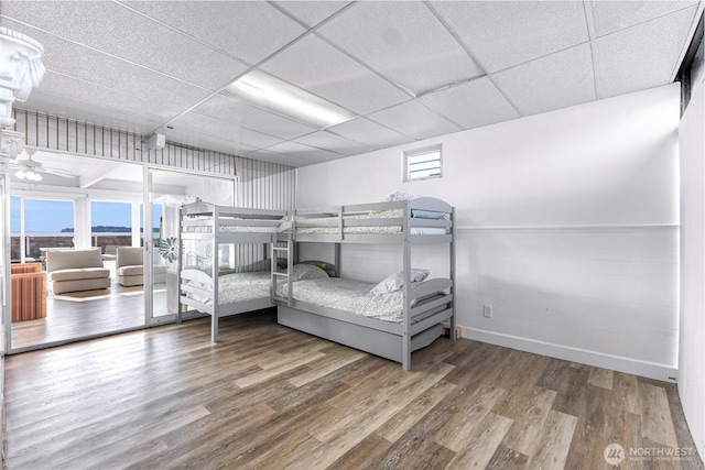 7491 Birch Bay Dr, Blaine, WA 98230 - bedroom with a paneled ceiling, wood finished floors, and baseboards