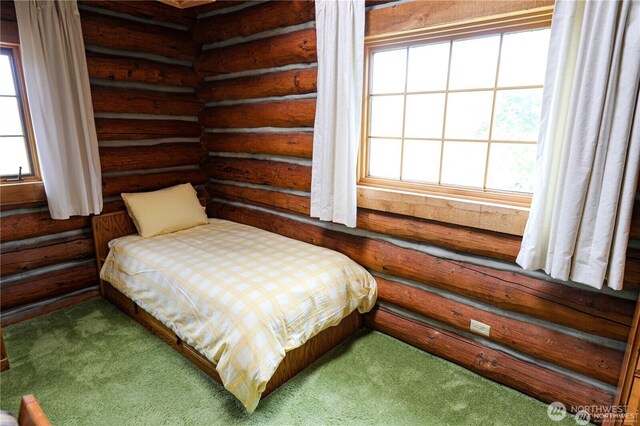 54 Center View Dr, Decatur Island, WA 98221 - carpeted bedroom with rustic walls and multiple windows
