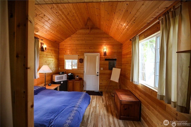 54 Center View Dr, Decatur Island, WA 98221 - bedroom featuring wooden walls, lofted ceiling, wood finished floors, and wood ceiling
